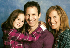 Lexi with parents Tom and Claudia